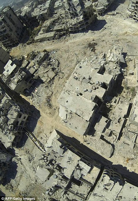 Destruction: This aerial view shows the destruction in the al-Khalidiyah neighbourhood of Homs, which has seen some of the heaviest fighting as government forces bid to flush rebels into the open